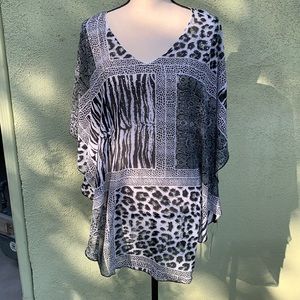 Memories poncho style bejeweled animal print round hem top 1 size fits most